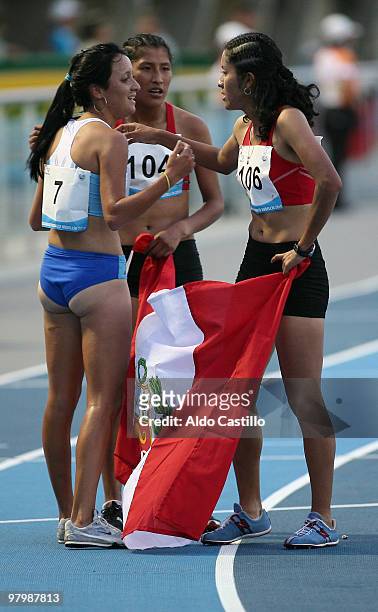Peruvian Rocio Huillca , golden medal, Jovana de la Cruz , silver, and Florencia Borelli of Argentina, bronze at the 3000 meters hurdles race...