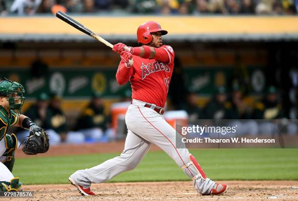 Luis Valbuena of the Los Angeles Angels of Anaheim bats against the Oakland Athletics in the top of the third inning at the Oakland Alameda Coliseum...