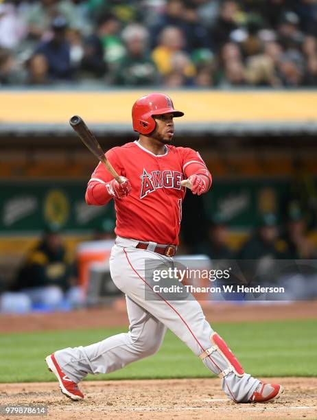 Luis Valbuena of the Los Angeles Angels of Anaheim bats against the Oakland Athletics in the top of the third inning at the Oakland Alameda Coliseum...