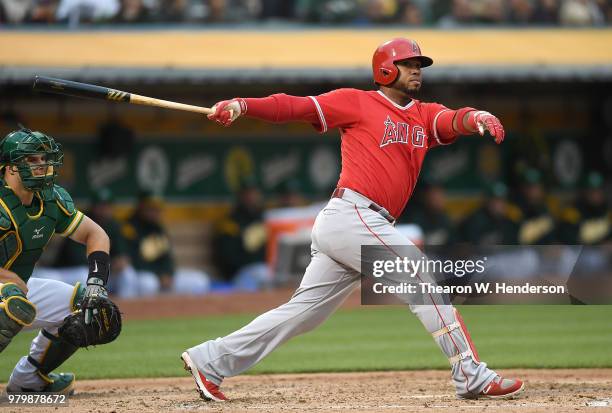 Luis Valbuena of the Los Angeles Angels of Anaheim bats against the Oakland Athletics in the top of the third inning at the Oakland Alameda Coliseum...