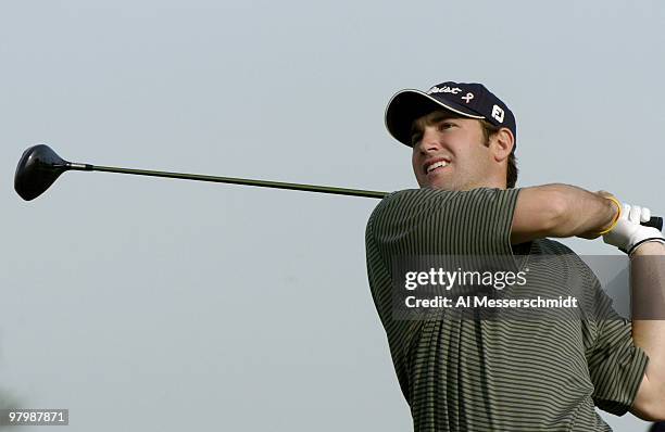 Curtis Strange's son, Thomas, tees off during final-round play in the Office Deport Father/Son Challenge at ChampionsGate Resort near Orlando,...