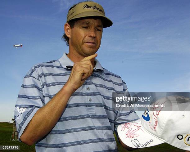 Lee Janzen signs autographs after final-round play in the Office Deport Father/Son Challenge at ChampionsGate Resort near Orlando, Florida December...