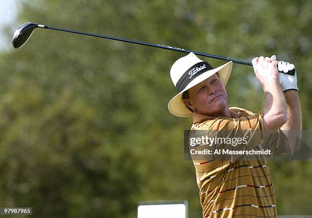 Tom Kite tees off during final-round play in the Office Deport Father/Son Challenge at ChampionsGate Resort near Orlando, Florida December 5, 2004.