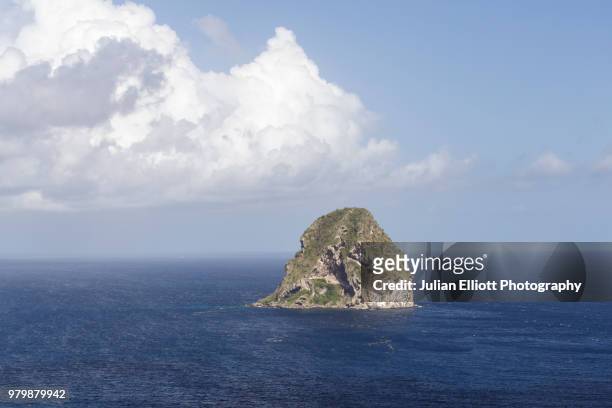 the rocher du diamant or diamond rock in martinique. - rocher stock pictures, royalty-free photos & images