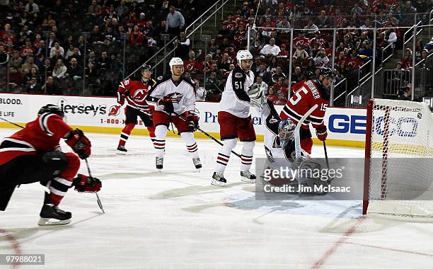 Steve Mason of the Columbus Blue Jackets surrenders a second period goal to Paul Martin of the New Jersey Devils at the Prudential Center on March...