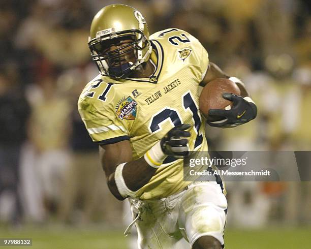 Georgia Tech wide receiver Calvin Johnson rushes upfield against Syracuse in the Champs Sports Bowl at the Florida Citrus Bowl, Orlando, Florida Dec...