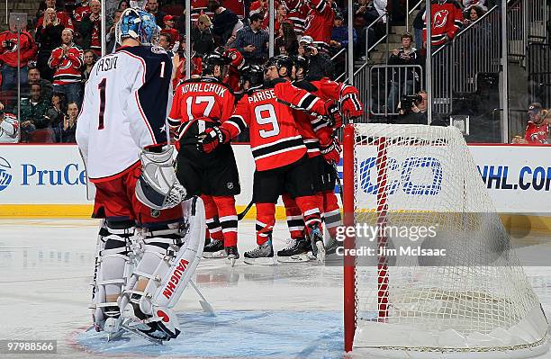 Ilya Kovalchuk of the New Jersey Devils celebrates his goal against Steve Mason of the Columbus Blue Jackets with his teammates at the Prudential...