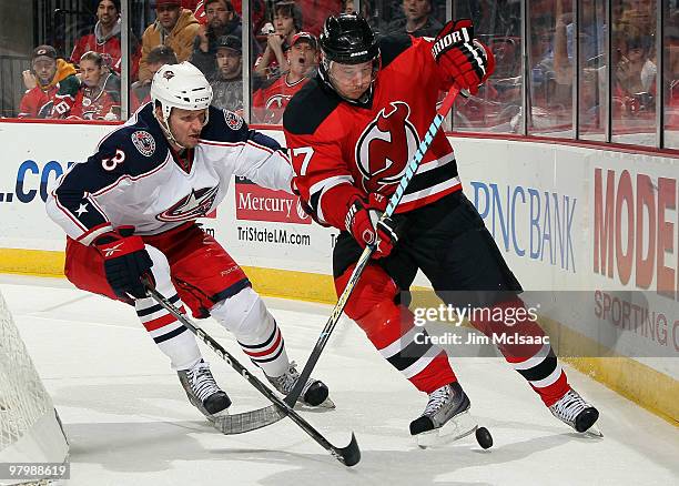 Marc Methot the Columbus Blue Jackets defends against Ilya Kovalchuk of the New Jersey Devils at the Prudential Center on March 23, 2010 in Newark,...