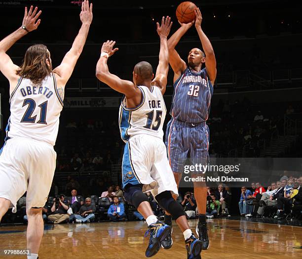 Boris Diaw of the Charlotte Bobcats shoots against Randy Foye of the Washington Wizards at the Verizon Center on March 23, 2010 in Washington, DC....