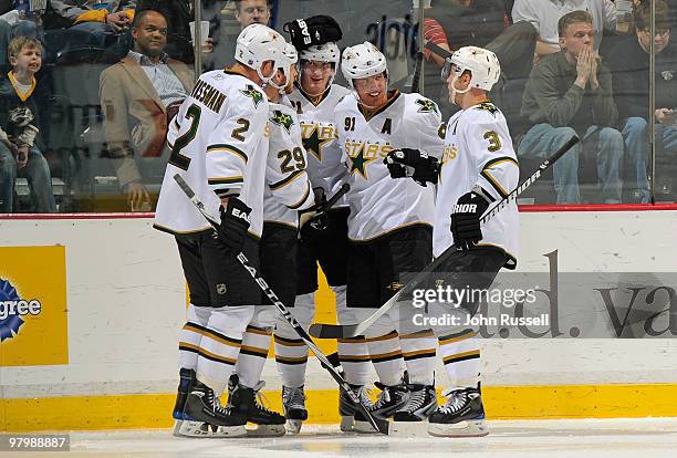 Nicklas Grossman, Steve Ott, Loui Eriksson, Brad Richards, and Stephane Robidas of the Dallas Stars celebrate after scoring a goal against the...