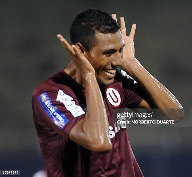 Luis Ramirez of Peru's Universitario celebrates his goal against Paraguay's Libertad during their Copa Libertadores football match in Asuncion on...