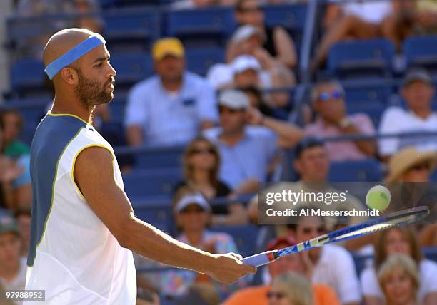 James Blake defeats Tommy Robredo 4-6 7-5 6-2 6-3 in a men's fourth round at the 2005 U. S. Open in Flushing, New York on September 5, 2005.