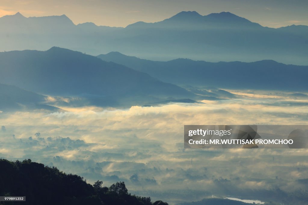 Fog in the valley at sunrise.