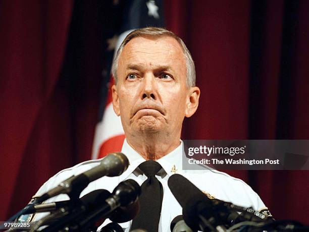 Shoot Prince William County Police Charlie T. Deane answers questions at a press conference concerning the shooting of a motorist at a gas station...