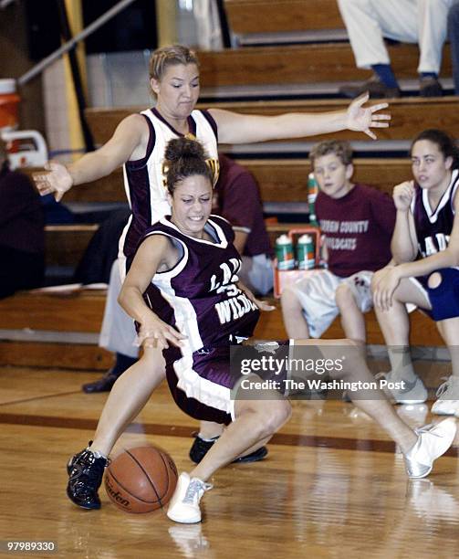 McDONALD FORCES W.C.'S 32 JESSICA WALKER TO LOSE THE BALL IN THE 1ST HALF.