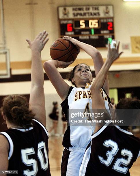 10/17/02 PHOTO BY : JOEL RICHARDSON DIG WARREN COUNTY LOSES TO BROAD RUN,,,,BROAD RUN'S 42 KIMBERLY VARGAS PUTS UP SHOT AND IS FOULED BT WARREN CO.'S...