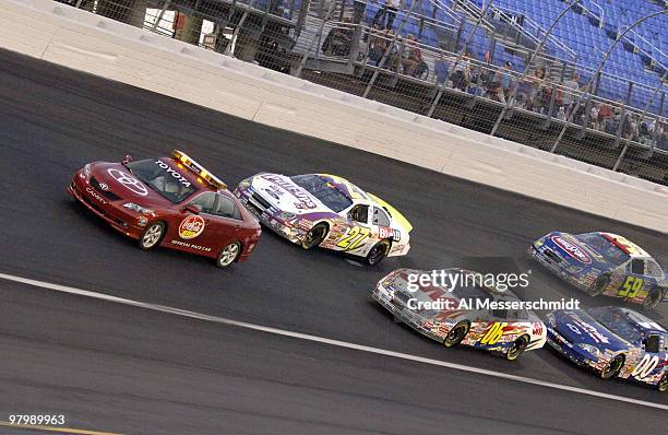 Toyota pace car leads race cars into turn four before the Carquest Auto Parts 300 Busch series race on May 26, 2006 at Lowe's Motor Speedway in...