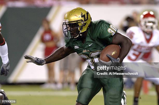South Florida running back Benjamin Williams rushes upfield against Rutgers on September 29, 2006 in Tampa, Florida. Rutgers won 22 - 20 to remain...