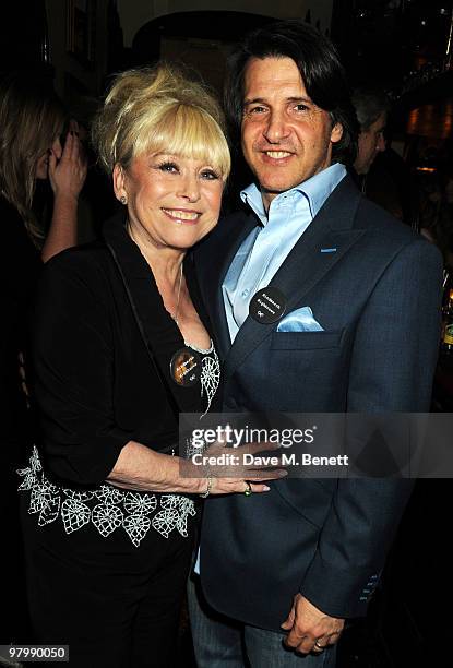 Barbara Windsor and Scott Mitchell attend the Vogue Pub Quiz hosted by Anya Hindmarch at The Bag & Bottle on March 23, 2010 in London, England.