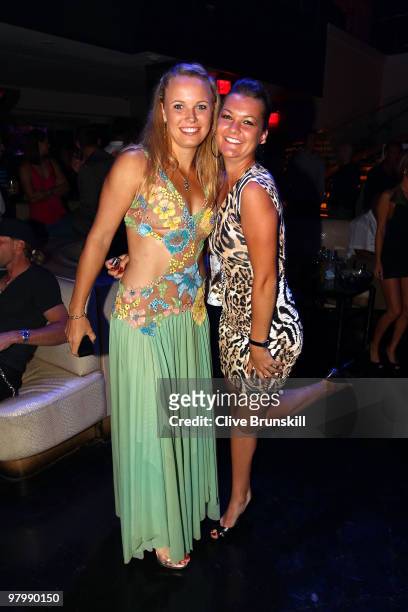 Caroline Wozniacki and Agnieszka Radwanska attend the Sony Ericsson Open Kick-Off party at LIV nightclub at Fontainebleau Miami on March 23, 2010 in...