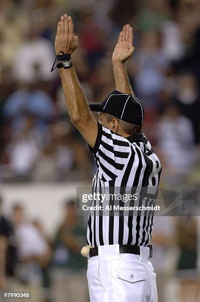 An NCAA official signals a score as South Florida hosts Rutgers on September 29, 2006 in Tampa, Florida. Rutgers won 22 - 20 to remain undefeated.