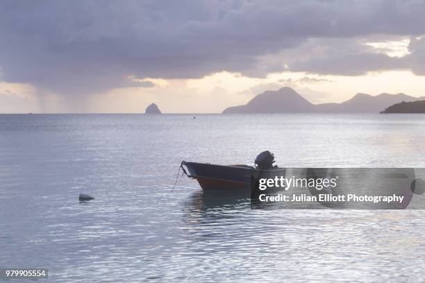 sunset on the island of martinique in the caribbean. - saint anne stock pictures, royalty-free photos & images