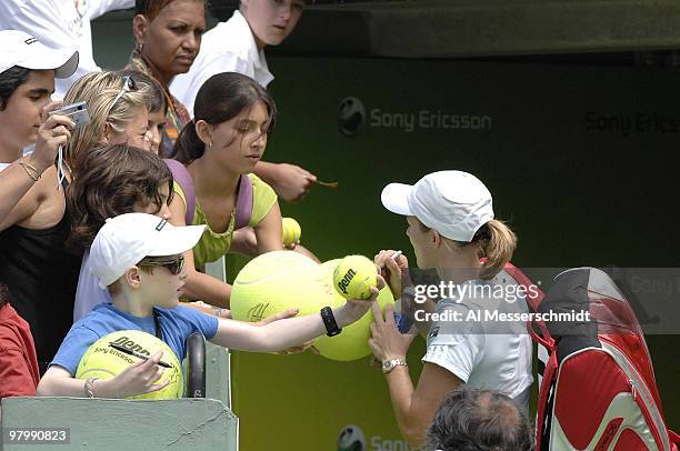 Justine Henin-Hardenne signs autographs after her 6-2, 6-3 victory over Anna Chakvetadze in a semi final at the 2007 Sony Ericsson Open in Key...