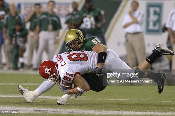Rutgers tight end Clark Harris grabs a pass over the middle against South Florida September 29, 2006 in Tampa. Rutgers won 22 - 20 to remain...