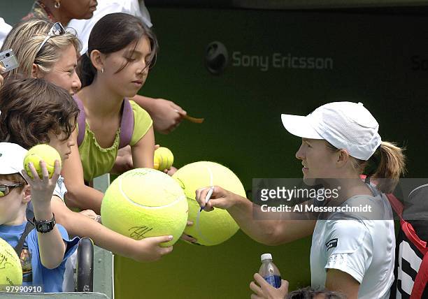Justine Henin-Hardenne signs autographs after her 6-2, 6-3 victory over Anna Chakvetadze in a semi final at the 2007 Sony Ericsson Open in Key...