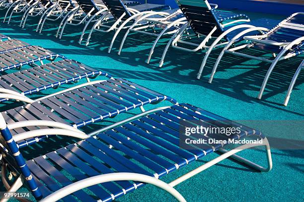 empty lounge chairs - spartan cruiser stock pictures, royalty-free photos & images