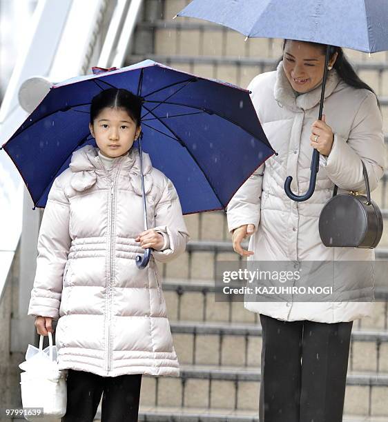 Japan's Crown Princess Masako and her daughter Princess Aiko arrive at Nagano Station, Nagano Prefecture in central Japan on March 24, 2010. The...