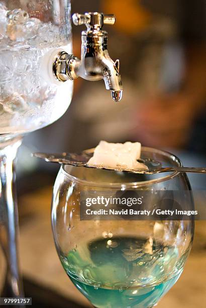 absinthe drip on sugar cube - absinthe stock pictures, royalty-free photos & images