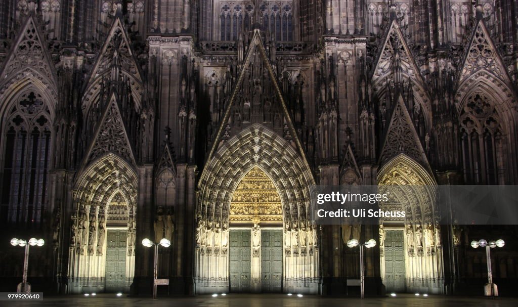 Entrance of Cologne Cathedral at night, Cologne, North Rhine-Westphalia, Germany