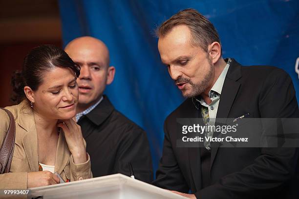 Singer Miguel Bose signs copies of his new album "Cardio" at MixUp Plaza Loreto on March 23, 2010 in Mexico City, Mexico.