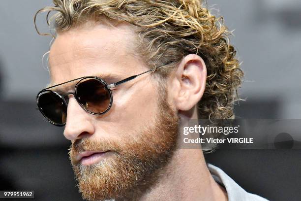 Model walks the runway at the Giorgio Armani fashion show during Milan Men's Fashion Week Spring/Summer 2019 on June 18, 2018 in Milan, Italy.