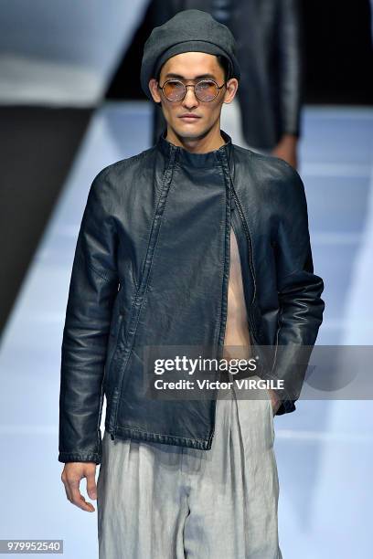 Model walks the runway at the Giorgio Armani fashion show during Milan Men's Fashion Week Spring/Summer 2019 on June 18, 2018 in Milan, Italy.