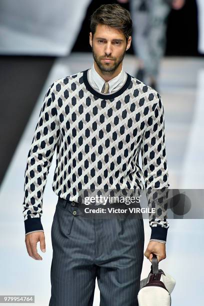 Model walks the runway at the Giorgio Armani fashion show during Milan Men's Fashion Week Spring/Summer 2019 on June 18, 2018 in Milan, Italy.