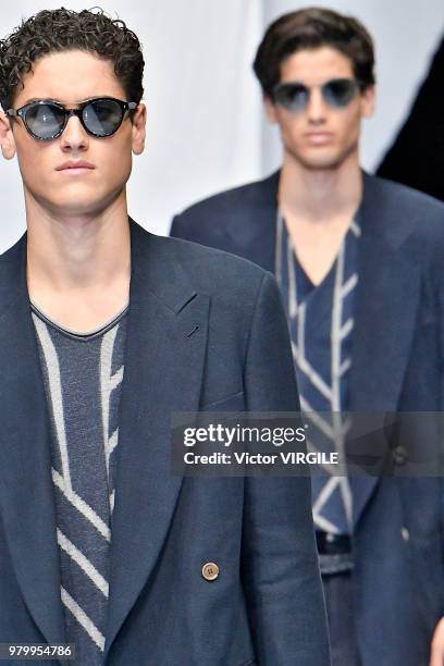 Model walks the runway at the Giorgio Armani fashion show during Milan Men's Fashion Week Spring/Summer 2019 on June 18, 2018 in Milan, Italy.