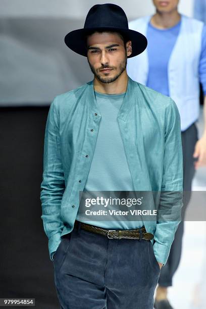 Model walks the runway at the Giorgio Armani fashion show during Milan Men's Fashion Week Spring/Summer 2019 on June 18, 2018 in Milan, Italy.