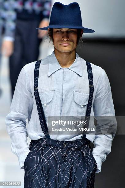 Model walks the runway at the Giorgio Armani fashion show during Milan Men's Fashion Week Spring/Summer 2019 on June 18, 2018 in Milan, Italy.