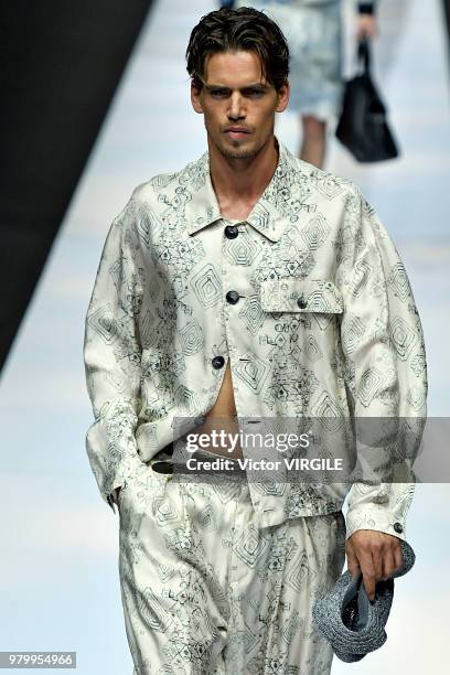 Model walks the runway at the Giorgio Armani fashion show during Milan Men's Fashion Week Spring/Summer 2019 on June 18, 2018 in Milan, Italy.