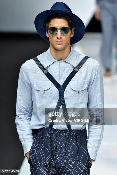 Model walks the runway at the Giorgio Armani fashion show during Milan Men's Fashion Week Spring/Summer 2019 on June 18, 2018 in Milan, Italy.