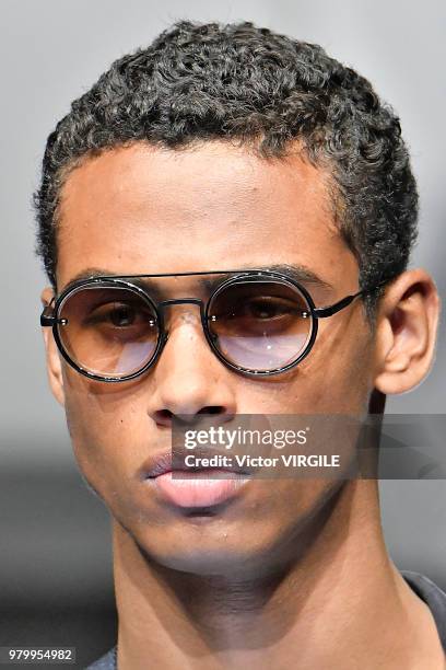 Model walks the runway at the Giorgio Armani fashion show during Milan Men's Fashion Week Spring/Summer 2019 on June 18, 2018 in Milan, Italy.