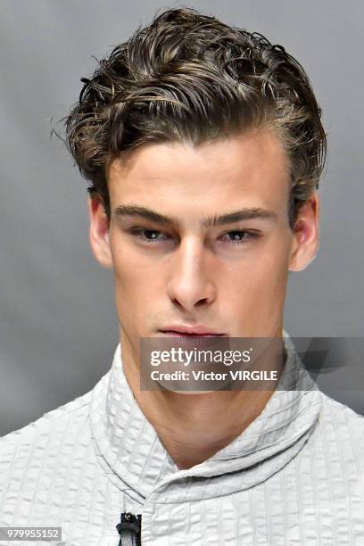 Model walks the runway at the Giorgio Armani fashion show during Milan Men's Fashion Week Spring/Summer 2019 on June 18, 2018 in Milan, Italy.