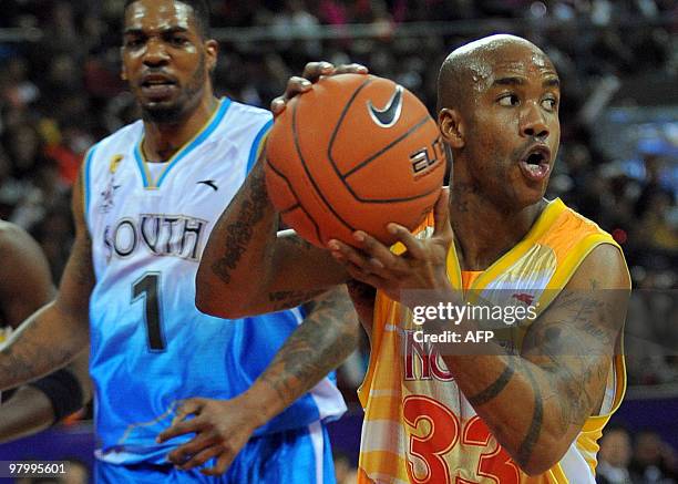 Basket-CHN-NBA-Marbury, FOCUS, by Robert Saiget Former New York Knick point guard Stephon Marbury prepares to pass the ball during Chinese Basketball...