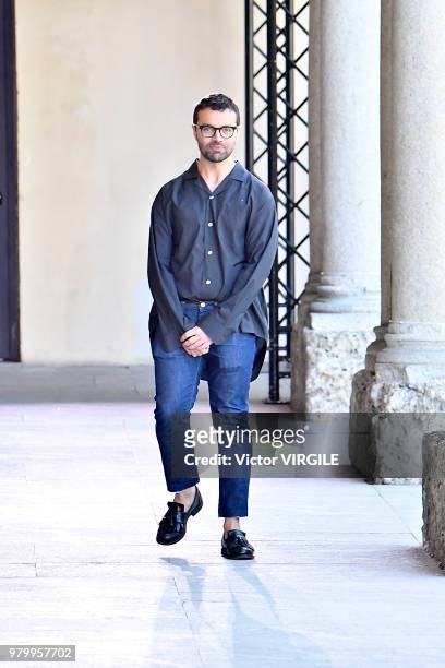 Fashion designer Rocco Iannone walks the runway at the Pal Zileri fashion show during Milan Men's Fashion Week Spring/Summer 2019 on June 18, 2018 in...
