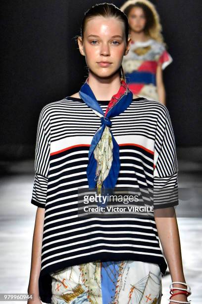 Model walks the runway at the Hunting World fashion show during Milan Men's Fashion Week Spring/Summer 2019 on June 18, 2018 in Milan, Italy.