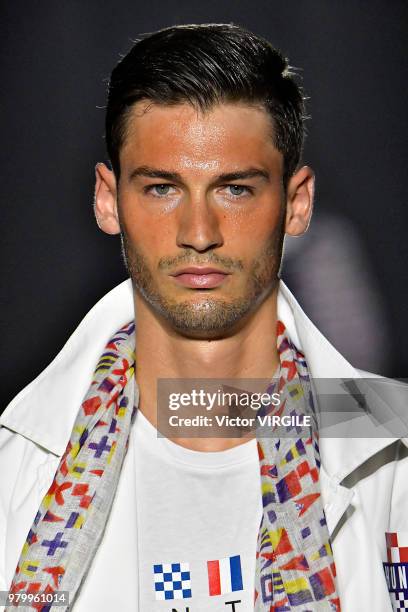 Model walks the runway at the Hunting World fashion show during Milan Men's Fashion Week Spring/Summer 2019 on June 18, 2018 in Milan, Italy.