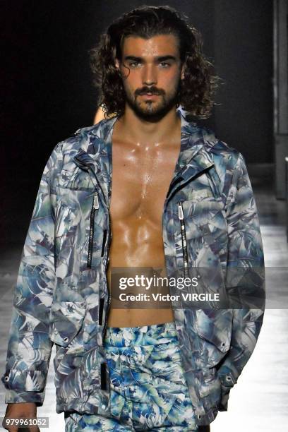 Model walks the runway at the Hunting World fashion show during Milan Men's Fashion Week Spring/Summer 2019 on June 18, 2018 in Milan, Italy.