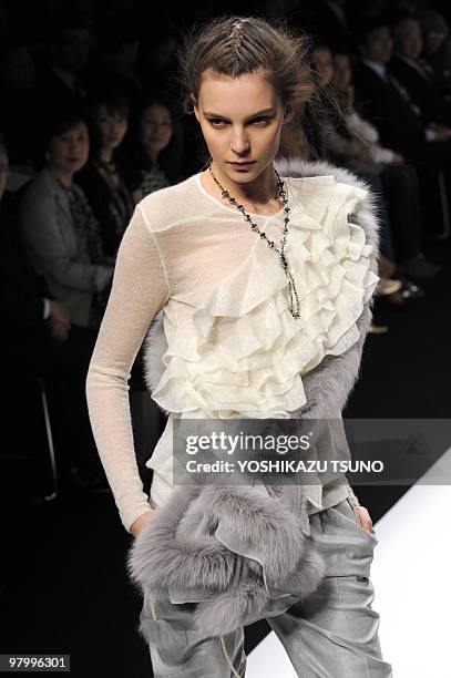 Model displays a creation from the Yuma Koshino 2010/2011 autumn and winter collection, designed by Yuma Koshino in Tokyo on March 24, 2010 as a part...